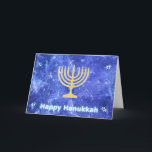Tarjeta Festiva Hanukkah Snowstorm Menorah<br><div class="desc">Un brillante oro Hanukkah menorah y "Happy Hanukkah" en un brillante texto azul y blanco superpuesto en una imagen fractal azul y blanco que recuerda a copos de nieve en una tormenta. ¡Chag Sameach!</div>