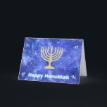 Tarjeta Festiva Hanukkah Snowstorm Menorah<br><div class="desc">Un brillante oro Hanukkah menorah y "Happy Hanukkah" en un brillante texto azul y blanco superpuesto en una imagen fractal azul y blanco que recuerda a copos de nieve en una tormenta. ¡Chag Sameach!</div>