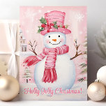 Tarjeta Festiva Holly Jolly Navidades cuestan a Snowman rosado<br><div class="desc">Celebra a los "Navidades de Holly Jolly" con esta encantadora tarjeta que incluye a un adorable muñeco de nieve vestido con un sombrero rosa y una bufanda, adornados con una sartén festiva. Perfecto para enviar alegres saludos de vacaciones a sus seres queridos, este diseño caprichoso seguro traerá sonrisas y alegría....</div>