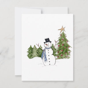Tarjeta Festiva Hombre de nieve en pinos saluda la temporada