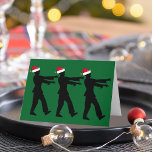 Tarjeta Festiva Humor de Navidades verdes zombis de Santa Funny<br><div class="desc">Zombis con sombreros de Santa Roja caminando en fila con brazos muertos o estirados frente a ellos. Una graciosa tarjeta verde de vacaciones para un fan del horror de estos Navidades.</div>
