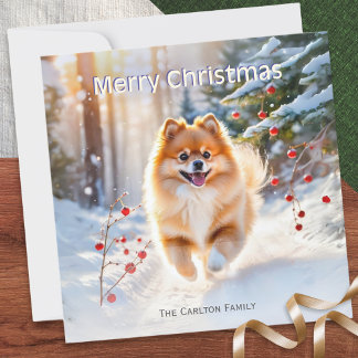 Tarjeta Festiva Imagen de perro pomerania en la nieve Feliz Navida