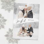 Tarjeta Festiva Joyful Script with Snowy Brushstroke 2-Photo<br><div class="desc">Modern minimalist holiday design featuring top and bottom photo templates with center white snowflake brushstroke,  "Joyful" script calligraphy and editable text field.</div>