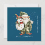 Tarjeta Festiva Llanto de negocios navideño Gnome y Snowman Merry<br><div class="desc">Un gnomo vestido de rojo se encuentra junto a un muñeco de nieve con un gorra de elfo verde y una bufanda roja. Están rodeadas por un polvo de nieve blanca que aparece en el fondo azul oscuro. La estética minimalista se crea con una simple Feliz Navidad a continuación y...</div>