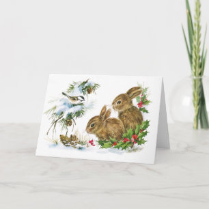 Tarjeta Festiva Los conejos y las aves disfrutan de la nieve