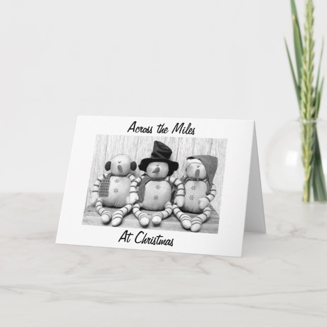 TARJETA FESTIVA LOS MUÑECOS DE NIEVE DICEN A TRAVÉS DE LAS MILLAS (Anverso)