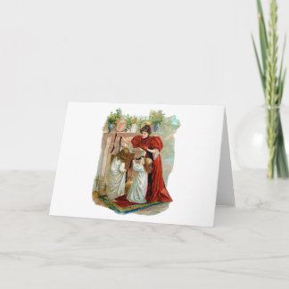 Tarjeta Festiva Madre e hijas en la noche antes de los Navidades