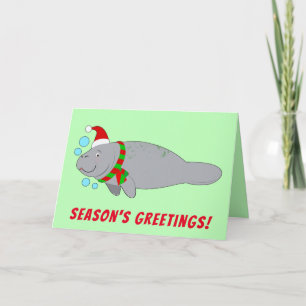 Tarjeta Festiva Manatí con sombrero y bufanda de Santa Saludos de