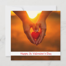 Manos sosteniendo corazón cálido bokeh San Valentí