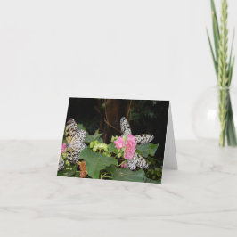 Tarjeta Festiva Mariposas amarillas en hojas tropicales