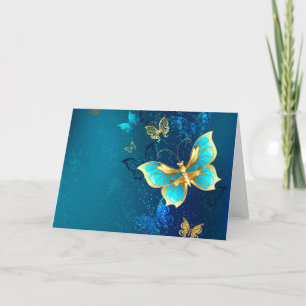 Tarjeta Festiva Mariposas doradas sobre fondo azul
