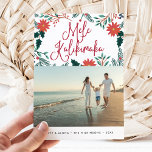Tarjeta Festiva Mele Kalikimaka | Hawaiian Christmas Photo<br><div class="desc">Send holiday greetings to friends and family, island-style, with our tropical holiday photo cards. Design features your favorite photo topped with the Hawaiian Christmas greeting "Mele Kalikimaka" in red hand lettered typography and vibrant red poinsettia flowers and holly leaves. Personalize with your names and custom greeting (shown with "love and...</div>