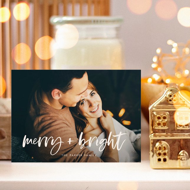 Tarjeta Festiva Merry y Bright | Dos Navidades de fotografía moder (A modern and elegant holiday card with two family photos and casual white typography)