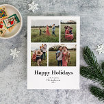 Tarjeta Festiva Modern Serif Múltiples Fotos Felices Fiestas<br><div class="desc">Esta tarjeta fotográfica multivacaciones limpia y moderna pone el foco en tus fotos. Cuenta con espacios para cuatro fotos diferentes a través de un sencillo texto en negrita que dice "Felices Fiestas".</div>