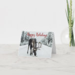 Tarjeta Festiva Moose In Winter Snow Christmas<br><div class="desc">A holiday card featuring a moose in the winter snow in the wilderness. A great holiday greeting for a friends and family. Bold red festive script typeface against a beautiful photograph.</div>