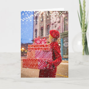 Tarjeta Festiva mujer con regalos navideños