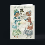 Tarjeta Festiva Mujer Snowman Cigarette Monocle Top Hat<br><div class="desc">Este muñeco de nieve parece que está en una noche de diversión. Esta vintage edición de Navidad muestra a dos mujeres sosteniendo la cabeza de un muñeco de nieve. El muñeco de nieve tiene un monóculo, un sombrero top y un cigarrillo en la boca. Es una escena invernal alrededor, una...</div>