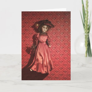 Tarjeta Festiva muñeca en la pared