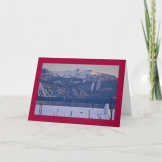 Tarjeta Festiva Muñeco de nieve en el borde del lago Tahoe