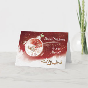 Tarjeta Festiva Navidad, nos hemos movido, chuchería con la casa