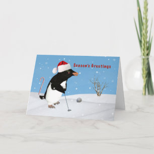Tarjeta Festiva Navidad, pingüino que juega al golf, el saludo de