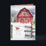 Tarjeta Festiva Navidades acuáticos en granero con nieve<br><div class="desc">Granero rojo con una corona de Navidades verdes,  un muñeco de nieve y un pájaro que lleva una bufanda de invierno en una antigua valla con copos de nieve. El texto se puede editar.</div>