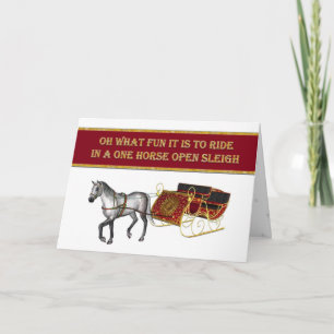 Tarjeta Festiva Navidades Caballo de rucio y trineos dorados elega