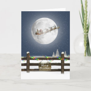 Tarjeta Festiva Navidades cercan con Santa y renos en la luna