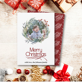 Tarjeta Festiva Navidades de flores, hojas verdes y bayas foto