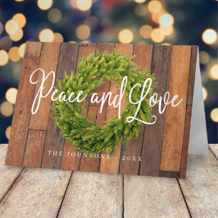 Tarjeta Festiva Navidades de guirnaldas botánicas rústicas