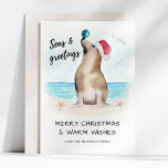 Tarjeta Festiva Navidades de la costa de Seal Santa Seas y Saludos<br><div class="desc">Celebra a los Navidades con esta adorable carta con una foca en un sombrero de Santa que balancea un adorno en su nariz. La leyenda "Seas & Greetings" (Mares y saludos) aporta vibraciones a la playa, lo que la convierte en perfecta para los amantes del océano y para los que...</div>