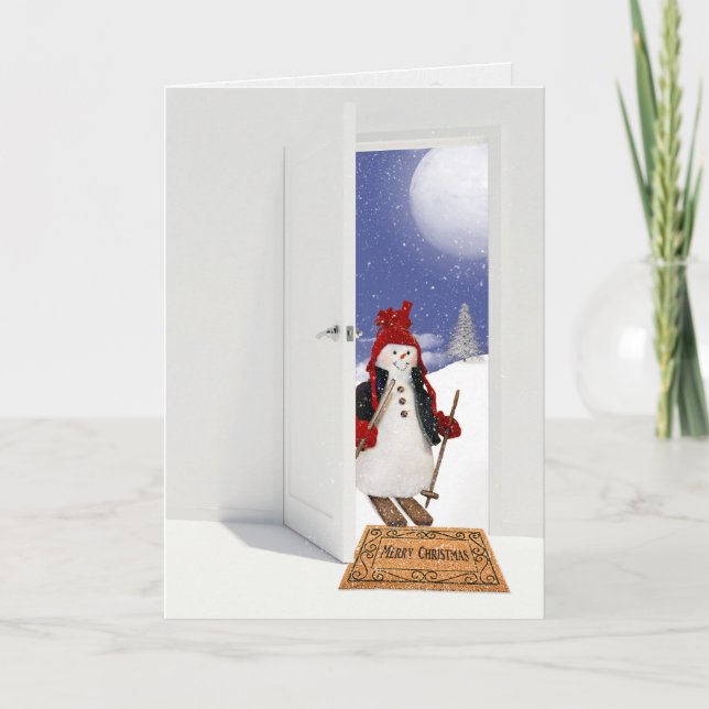 Tarjeta Festiva Navidades de snowman en esquís en la puerta (Anverso)