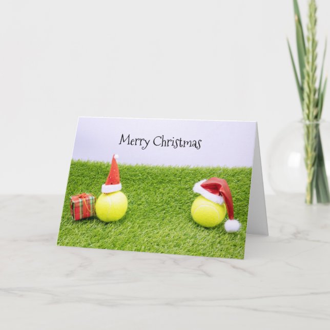 Tarjeta Festiva Navidades de tenis con pelota de tenis y Santa hat (Anverso)