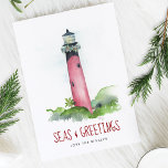 Tarjeta Festiva Navidades del faro acuático Florida Beach<br><div class="desc">Esta tarjeta de Navidades temáticos de la costa presenta mi acuarela original Júpiter pintada a mano, faro de Florida con una hilera de guirnaldas en tonos rojos y verdes sobre un crujiente fondo blanco. Las palabras Seas y Greetings se establecen en una tipografía de escritura de pincel moderna en rojo...</div>