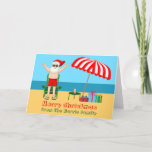 Tarjeta Festiva Navidades del Personalizado Cute Sunny Beach Santa<br><div class="desc">Esta bonita tarjeta de Navidades soleados personalizado es la postal perfecta para hacer buen tiempo en la piscina o la playa. Hacerlo un divertido espectáculo con la temática del polo norte con Santa Claus en sus baúles de natación al lado de un paraguas de playa de rayas rojas y blancas...</div>