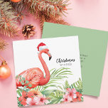 Tarjeta Festiva Navidades Flamingo Floral Greenerings Wiers<br><div class="desc">Hermoso flamingo con sombrero de Santa con flores tropicales y vegetación. Tipografía en escritura y moderna. mensaje personalizado o eliminación de texto para un mensaje manuscrito. A la familia y a los amigos les encantará conseguir esta tarjeta de vacaciones.</div>