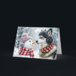 Tarjeta Festiva Navidades Husky Dog y Snowman Friends<br><div class="desc">Un perro husky y un muñeco de nieve se enfrentan unos a otros rodeados por un paisaje nevado</div>