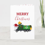 Tarjeta Festiva Navidades reciclando camión basura<br><div class="desc">Un lindo ilustracion de Navidades reciclando un camión de basura usando un sombrero de Papá Noel y decorado con luces de Navidades con palabras "Feliz Navidad". Un diseño de tarjetas para Navidades ideales para los entusiastas de camiones de basura grandes o pequeños,  chicas o niños.</div>