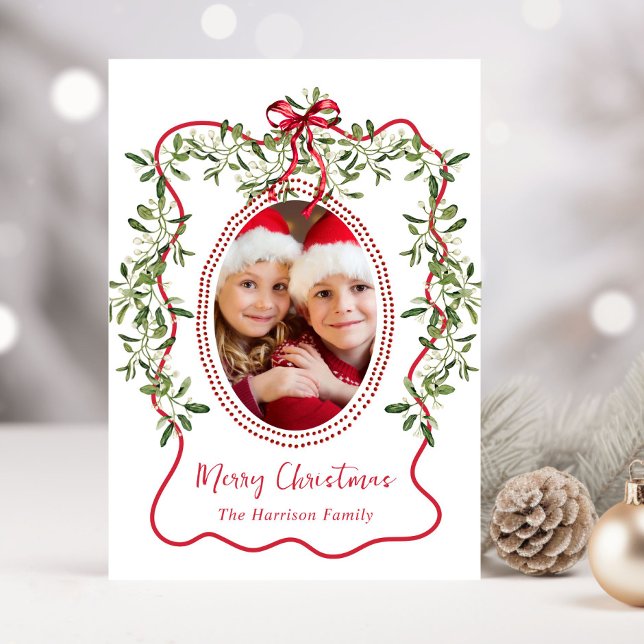 Tarjeta Festiva Navidades Rojo Wavy Frame Bow Greenery Photo (Share the love and warmth of the holiday season with this personalized photo Christmas card)