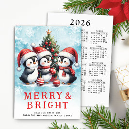 Tarjeta Festiva Navidades rojos y azules pingüinos moros y brillan