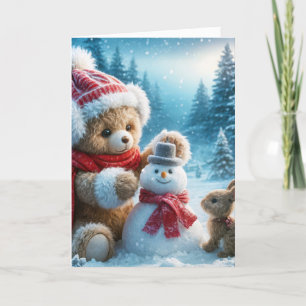 Tarjeta Festiva Navidades Teddy Bear construyendo un muñeco de nie