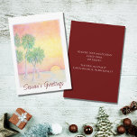 Tarjeta Festiva Navidades Tropical Beach Sunset Palm Trees<br><div class="desc">Tarjeta de saludo de Navidades Tropical Beach,  con palmeras,  imagen de puesta de sol y tipografía de escritura. Con grabado de personalizable,  puede agregar su propia información. Una forma festiva de enviar los deseos de vacaciones a amigos y familia de los trópicos.</div>