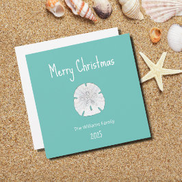 Tarjeta Festiva Navidades tropicales en la playa de arena Verde az