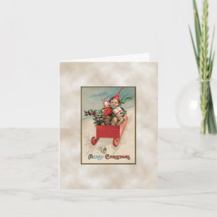 Tarjeta Festiva Navidades Vintage boy en un trineo