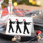 Tarjeta Festiva Navidades zombies de Santa Lucía<br><div class="desc">Zombis con sombreros de Santa Roja caminando en fila con los brazos muertos estirados frente a ellos. Un increíble regalo de vacaciones para un fanático del horror.</div>