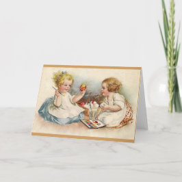 Tarjeta Festiva Niñas del vintage que colorean los huevos de