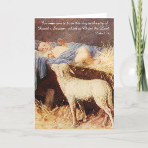 Tarjeta Festiva Niño Jesús en un pesebre con cordero