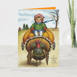 Tarjeta Festiva Niño turco de Acción de Gracias montando calabaza