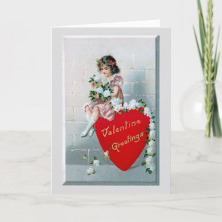 Tarjeta Festiva Niño vintage con saludos de San Valentín en el cor