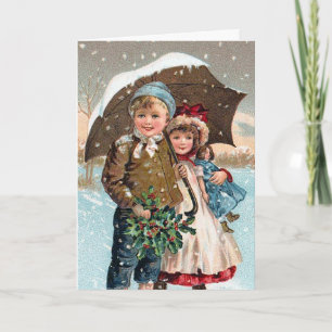 Tarjeta Festiva Niños caminando por la nieve